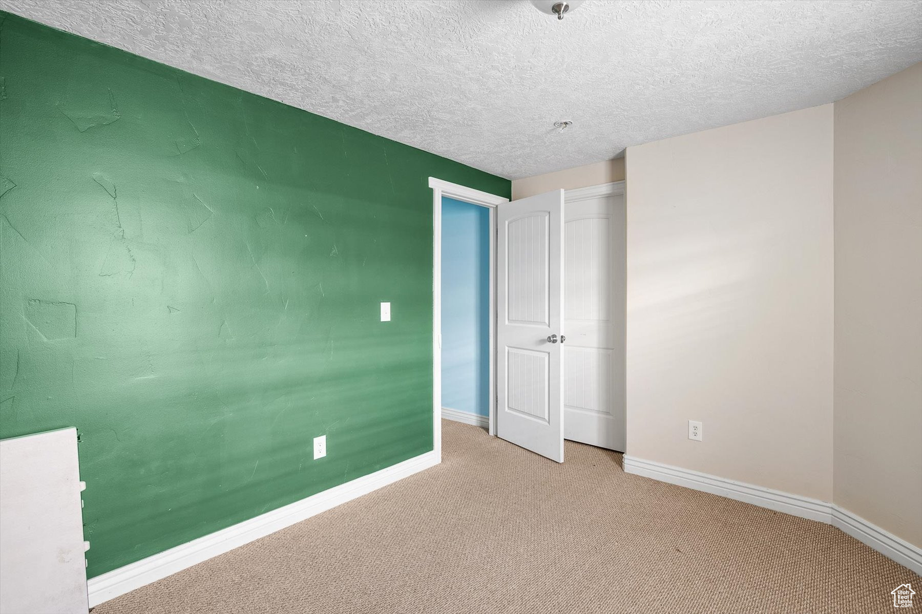 Interior space with a textured ceiling