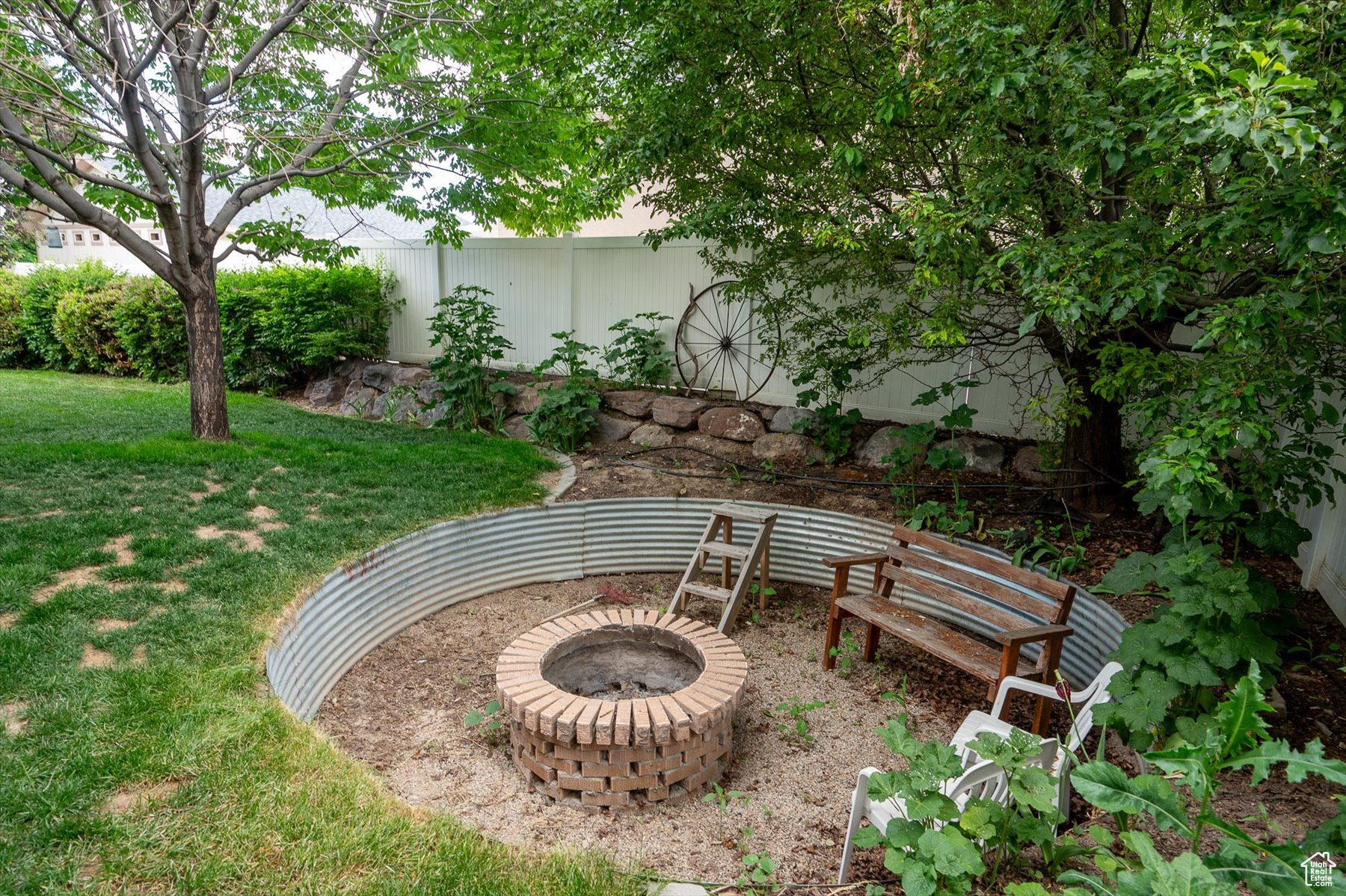 View of yard with a fire pit