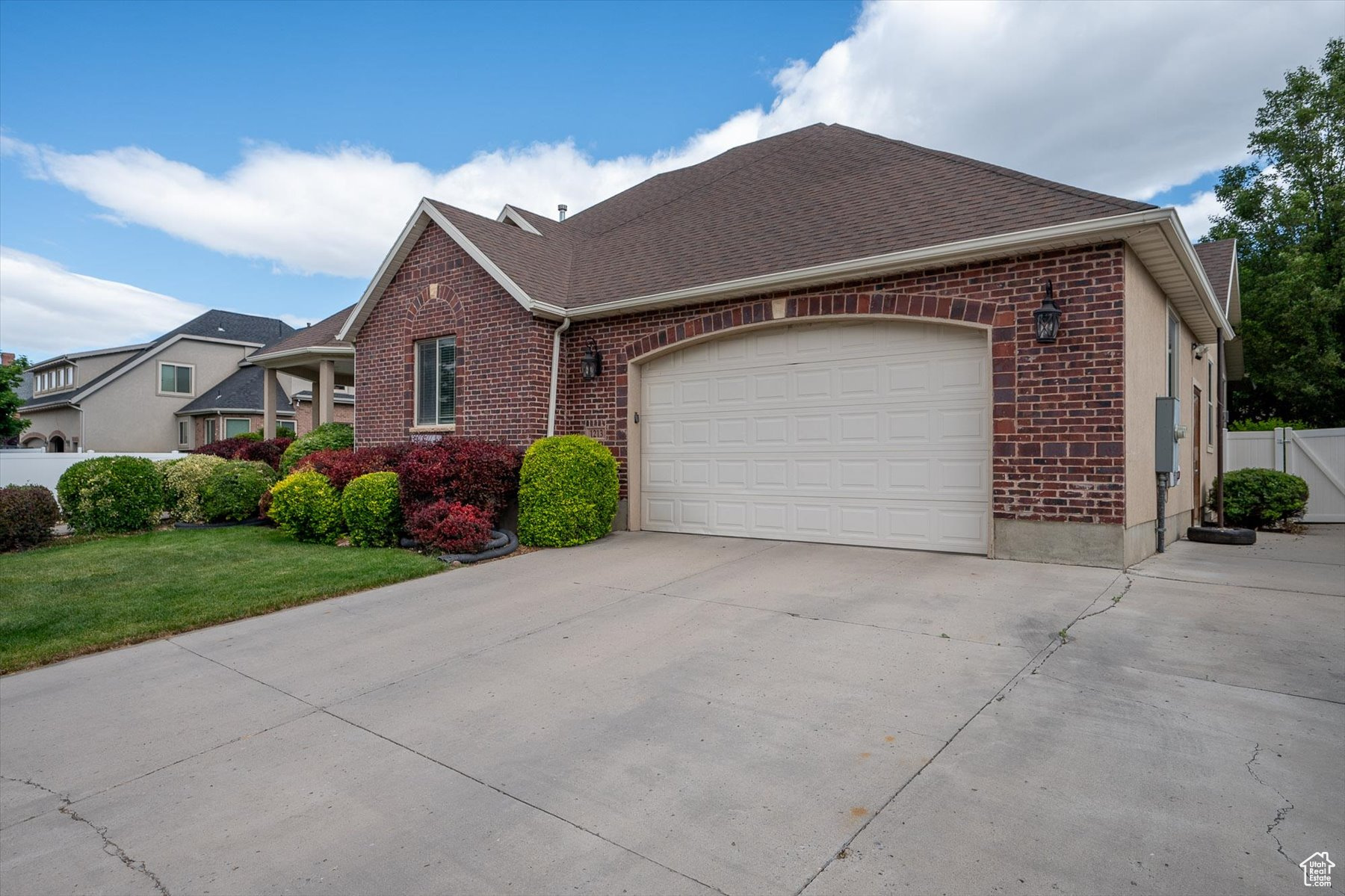 Home features beautiful landscaping a garage and RV parking!