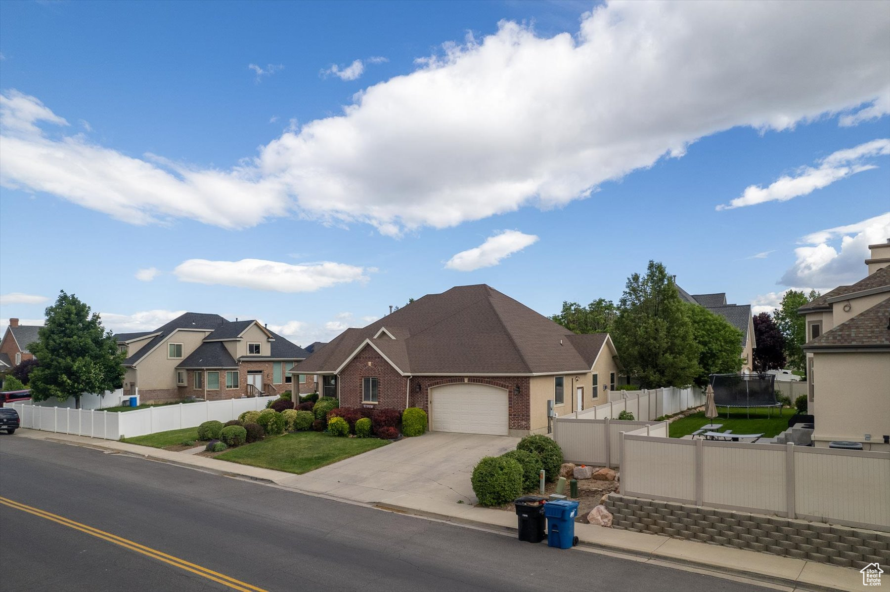 Front of home featuring a 2 car garage, RV Parking