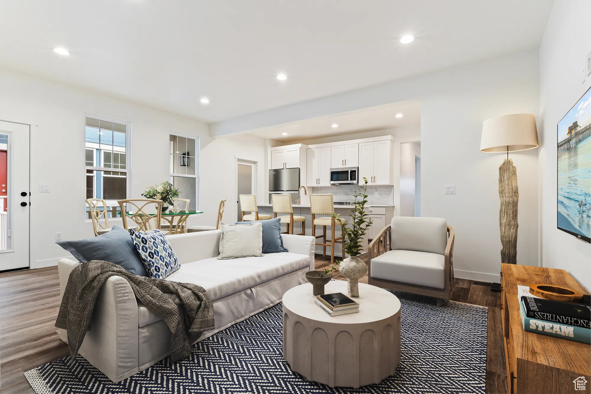 Living room with dark wood-type flooring