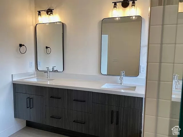 Bathroom featuring dual vanity