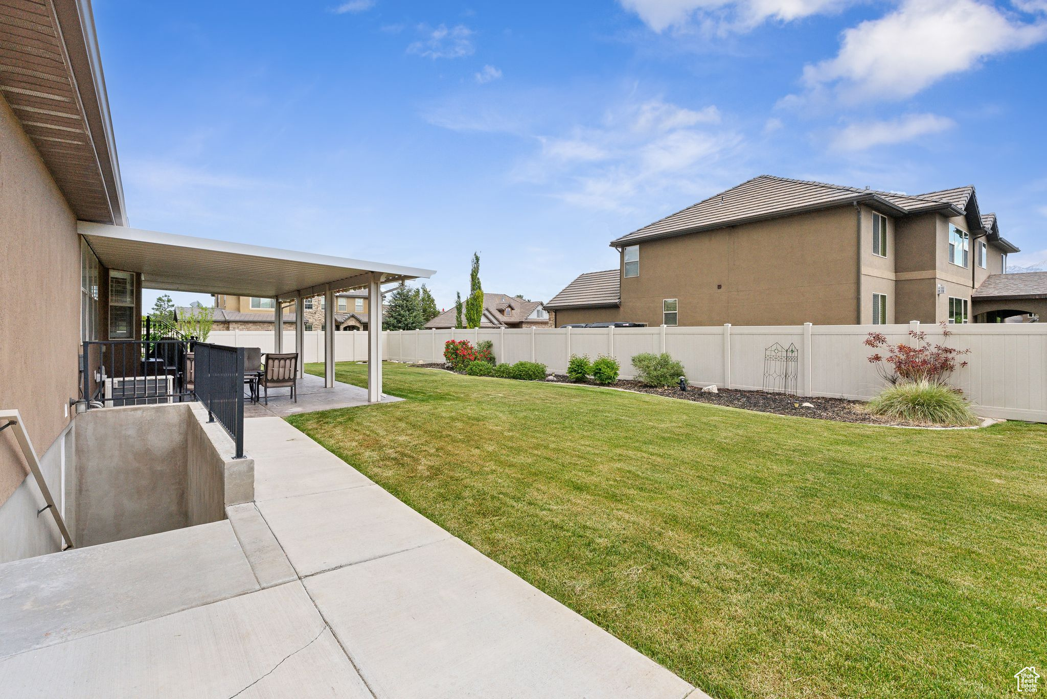 View of yard with a patio area