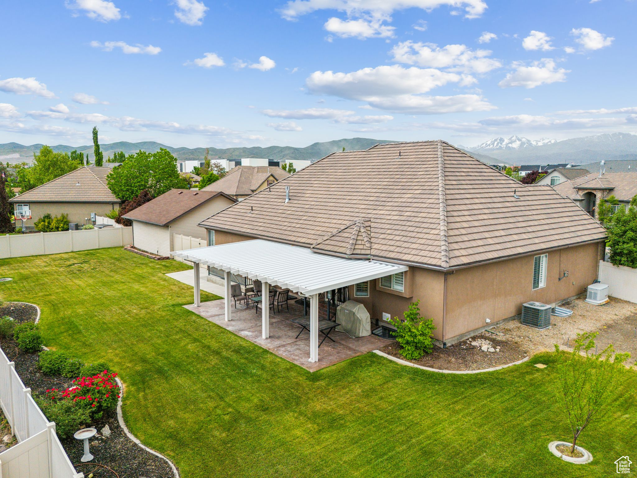 Exterior space featuring central AC, a mountain view, and a patio