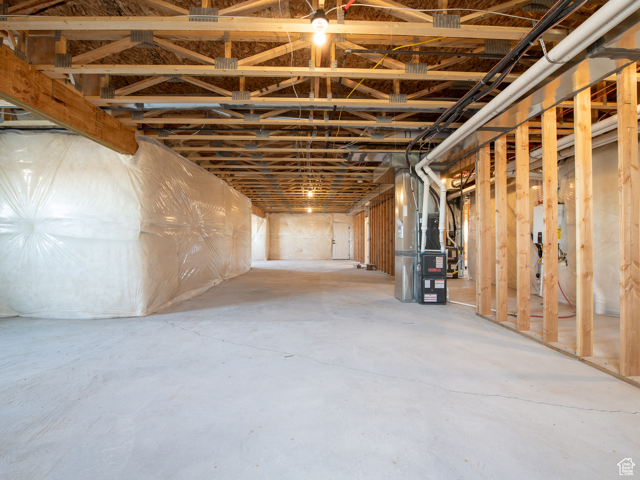 Basement with heating utilities. This is a picture of Helena model home. Not the interior of actual home.