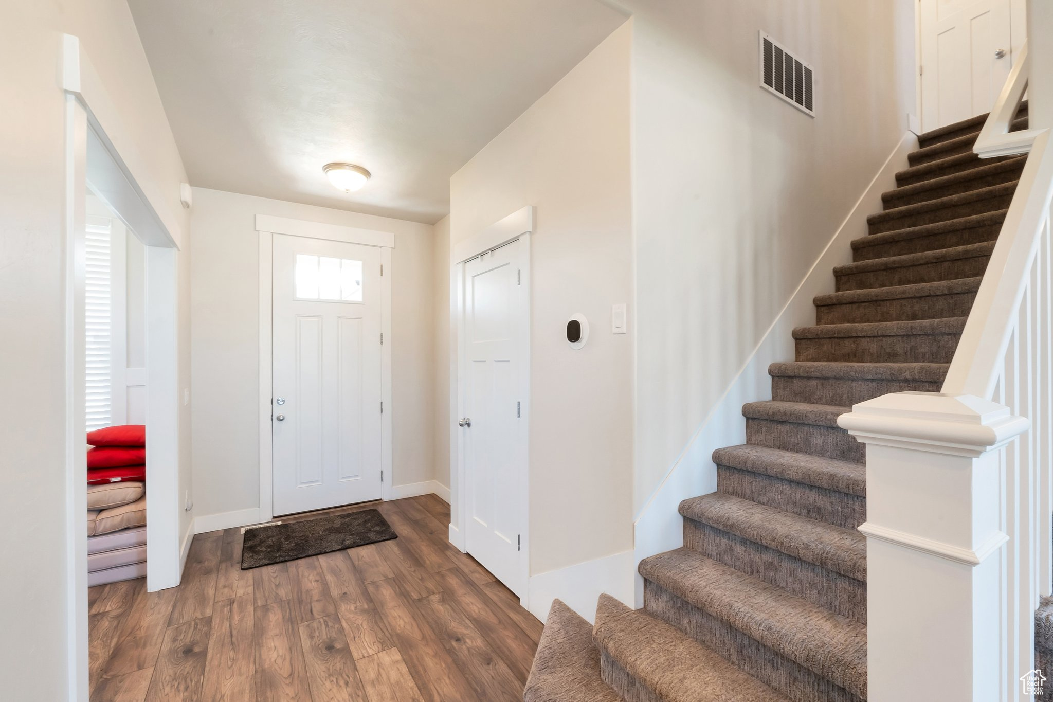 Foyer featuring dark hardwood / wood-style floors