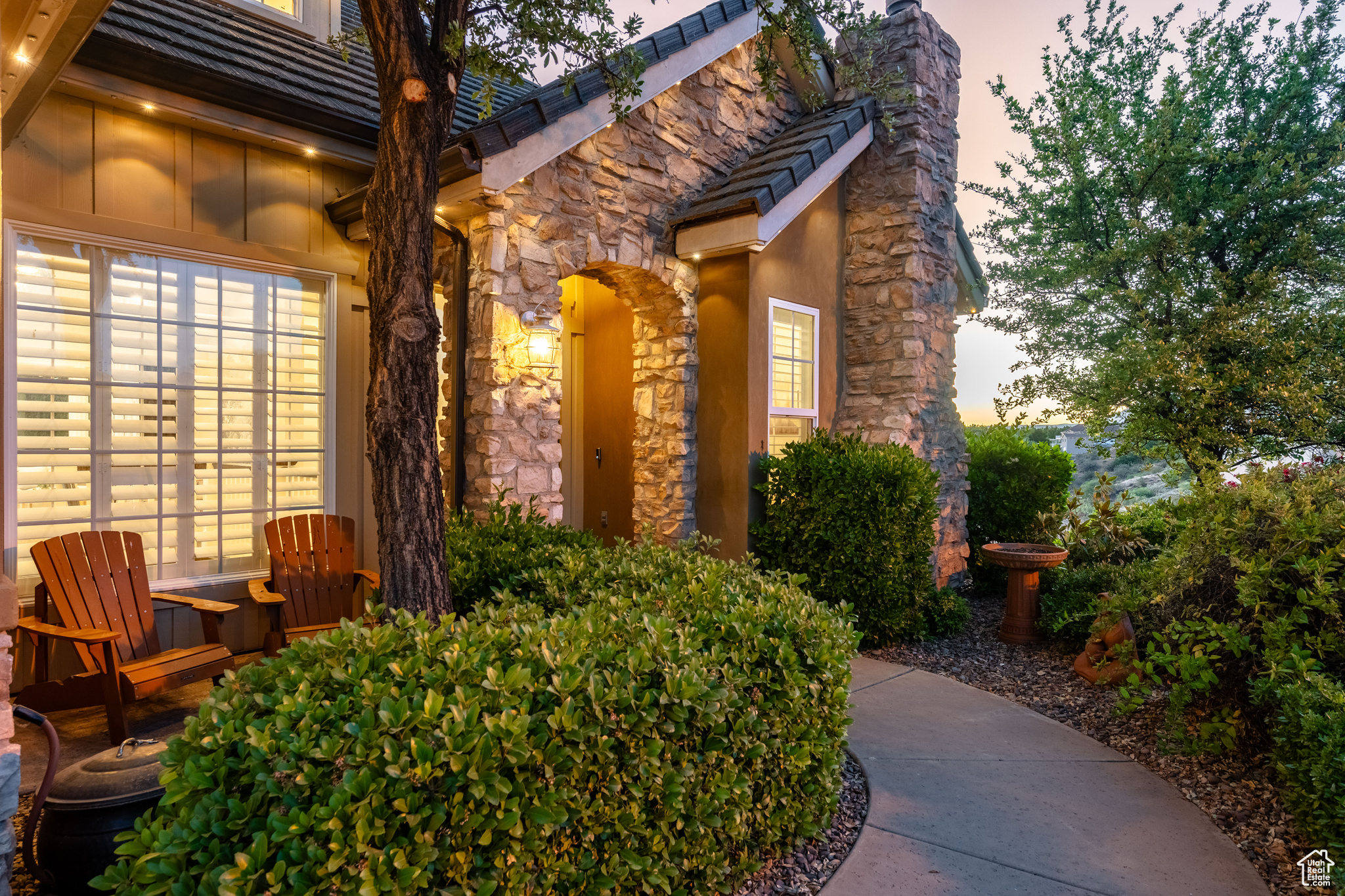 View of exterior entry at dusk