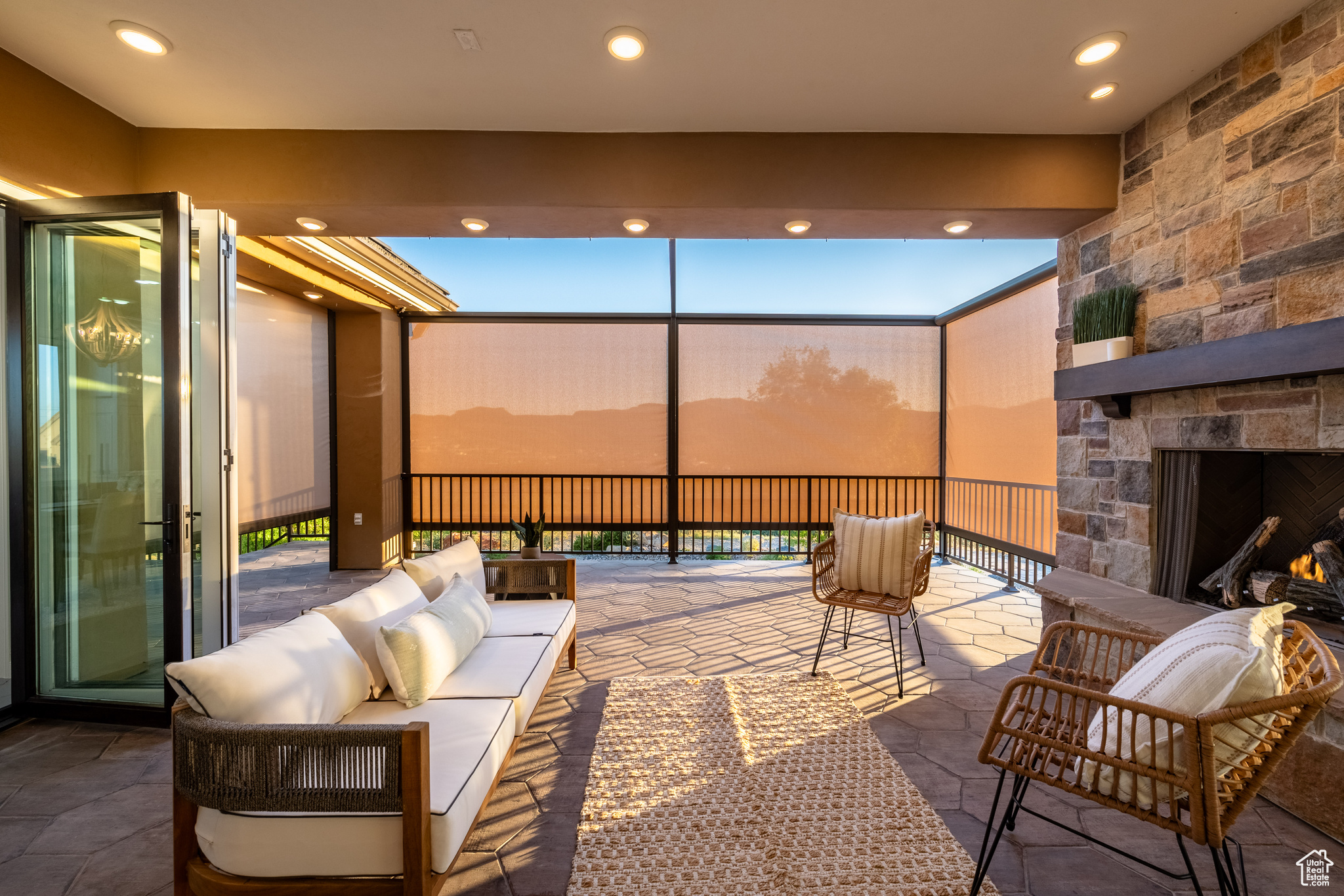 View of patio / terrace featuring an outdoor living space with a fireplace