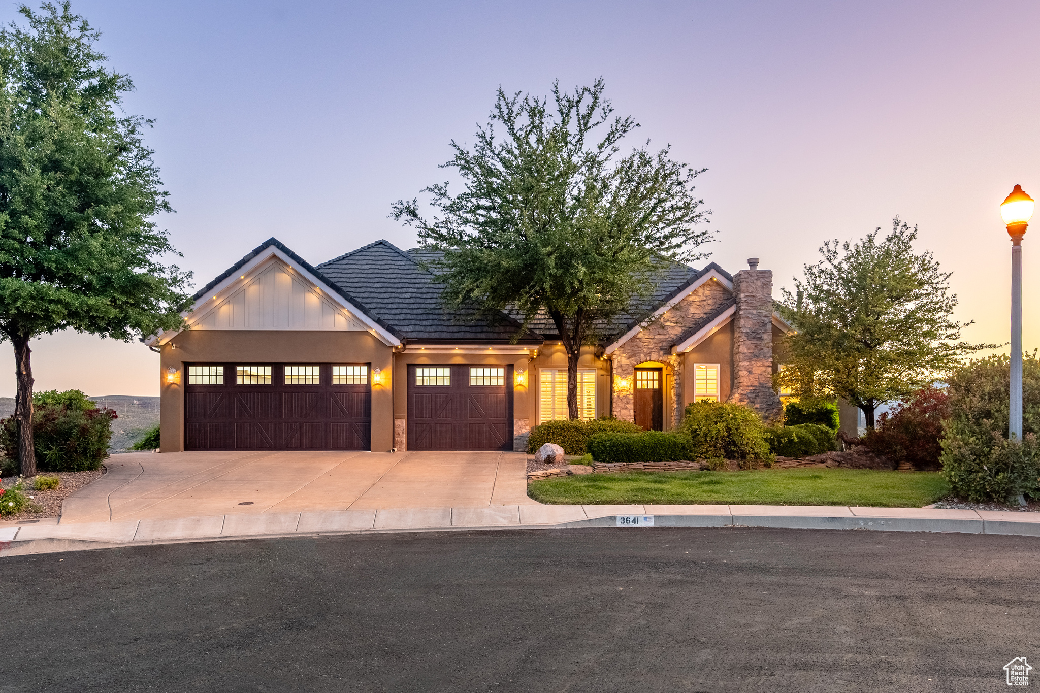 View of front of house with a garage