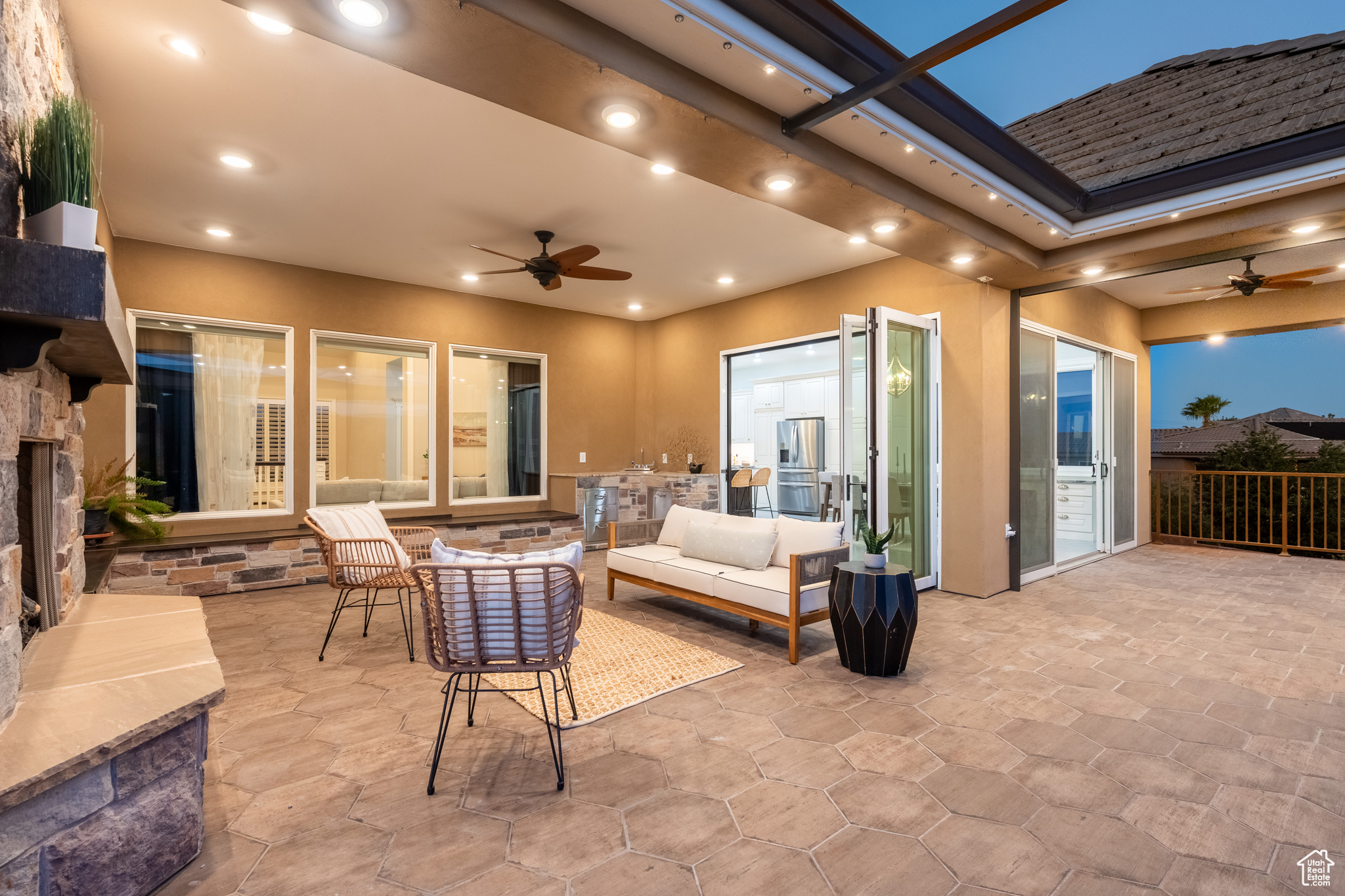 View of patio / terrace with ceiling fan and an outdoor hangout area