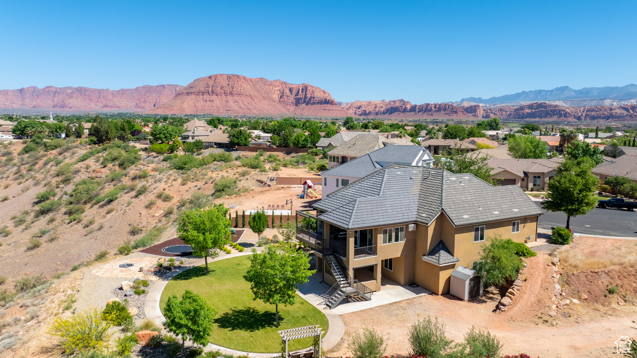 Birds eye view of property with a mountain view