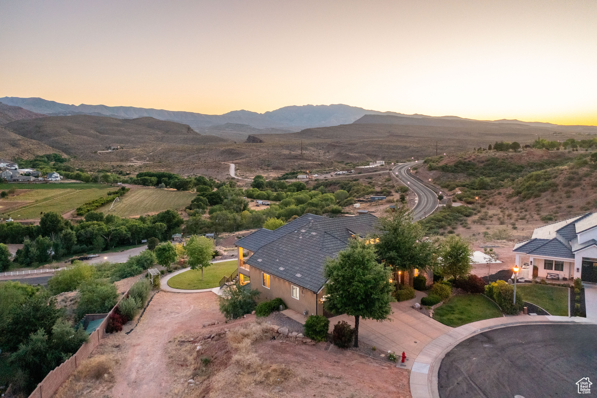 Aerial view at dusk with a mountain view