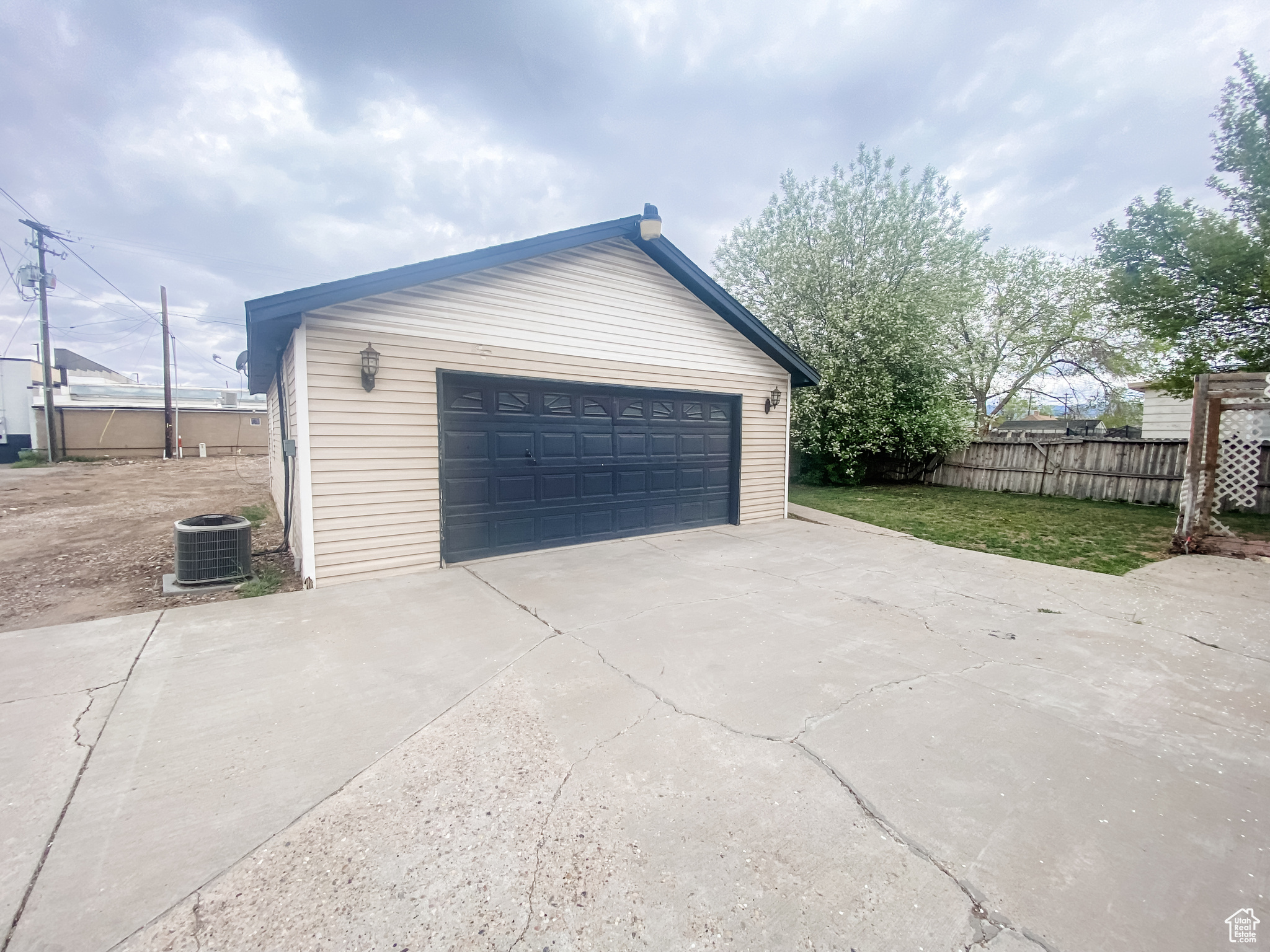 Garage that has HVAC and carpeted flooring.  Could be used for additional office space/storage or could be made into an additional apartment.