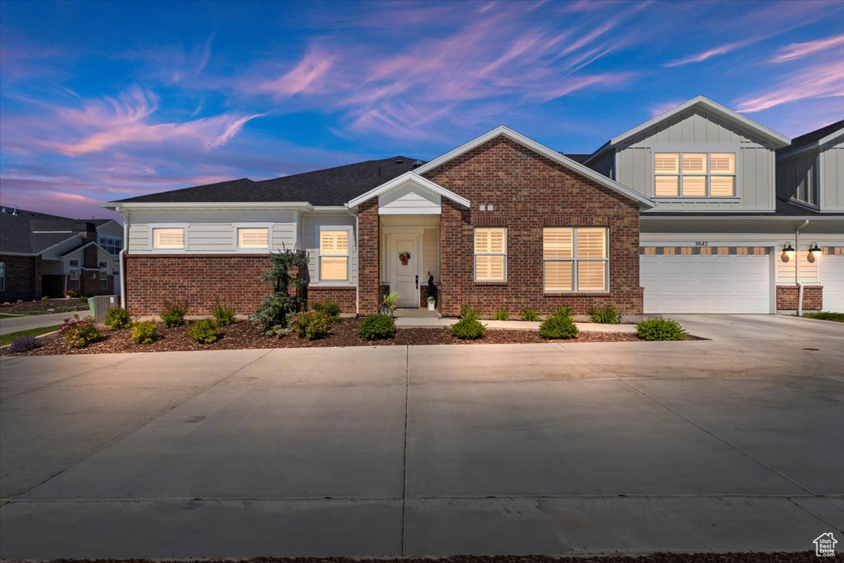 View of front of home with a garage