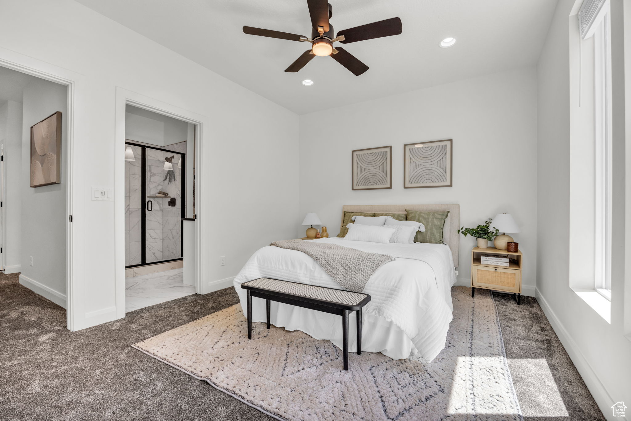 Bedroom featuring carpet and ceiling fan