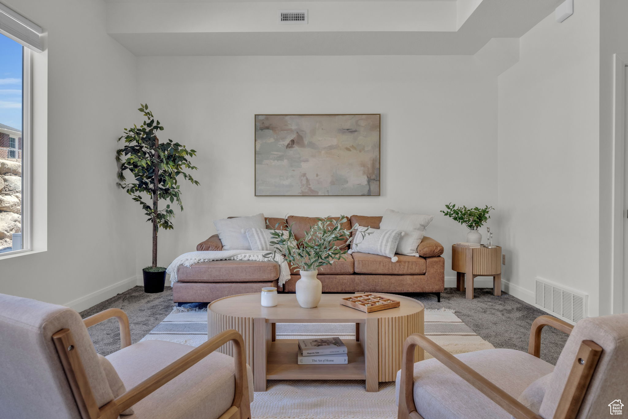 Living room featuring plenty of natural light