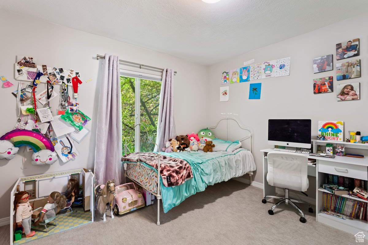 Bedroom featuring carpet