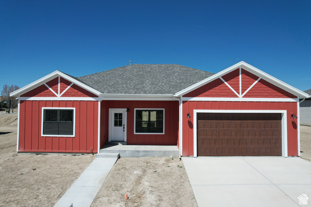 Single story home with a garage