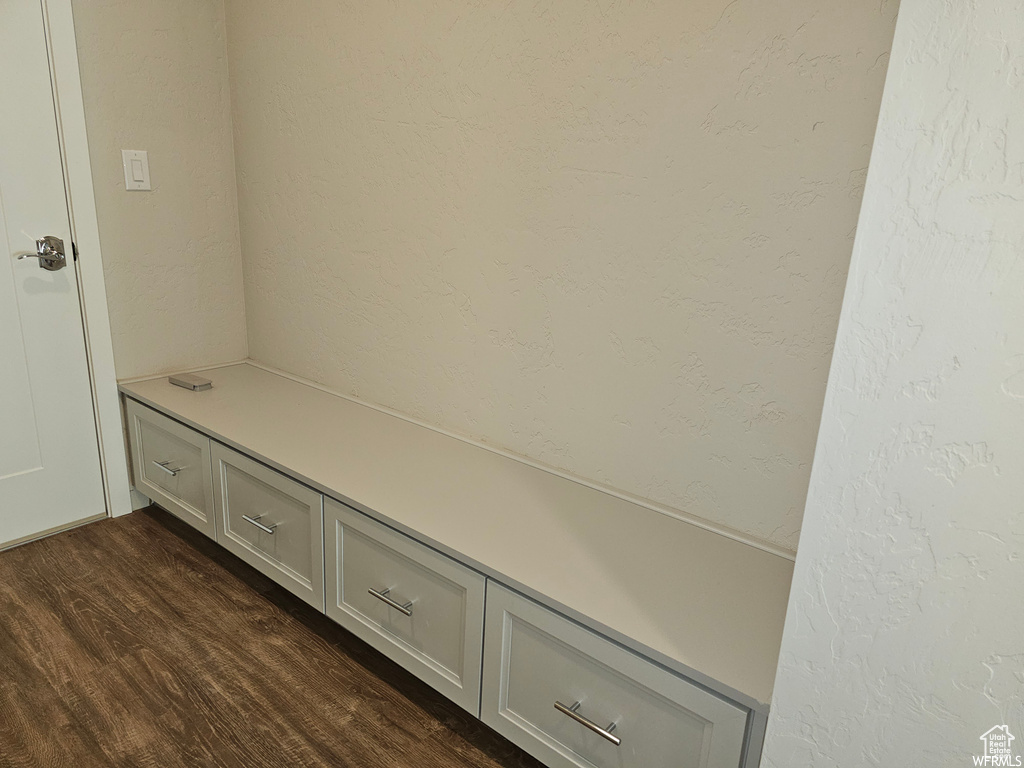 Mudroom with dark hardwood / wood-style floors