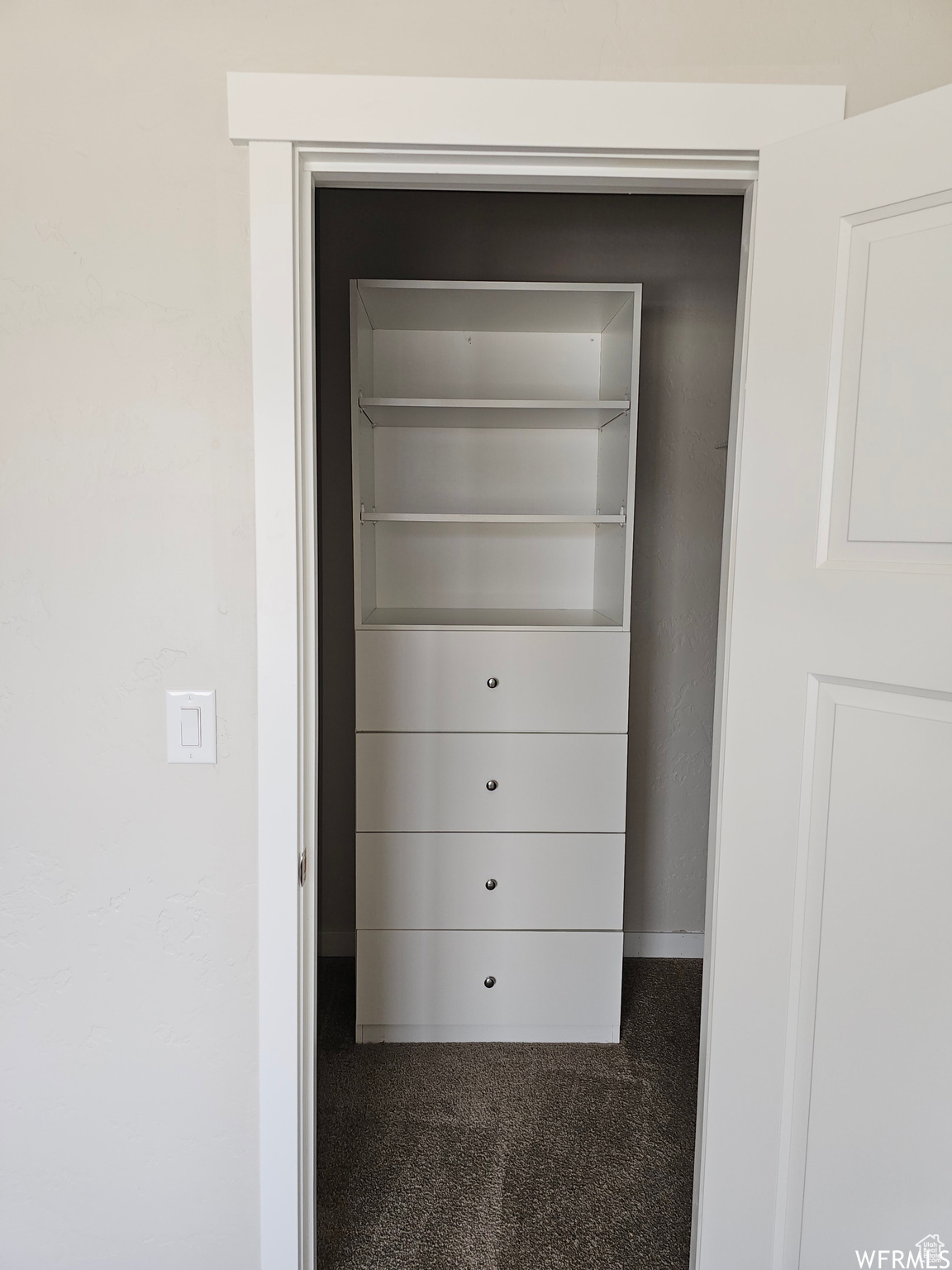 Interior space featuring carpet floors