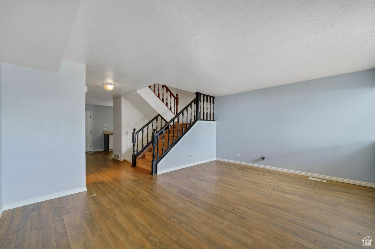 Family room featuring hardwood / wood-style floors