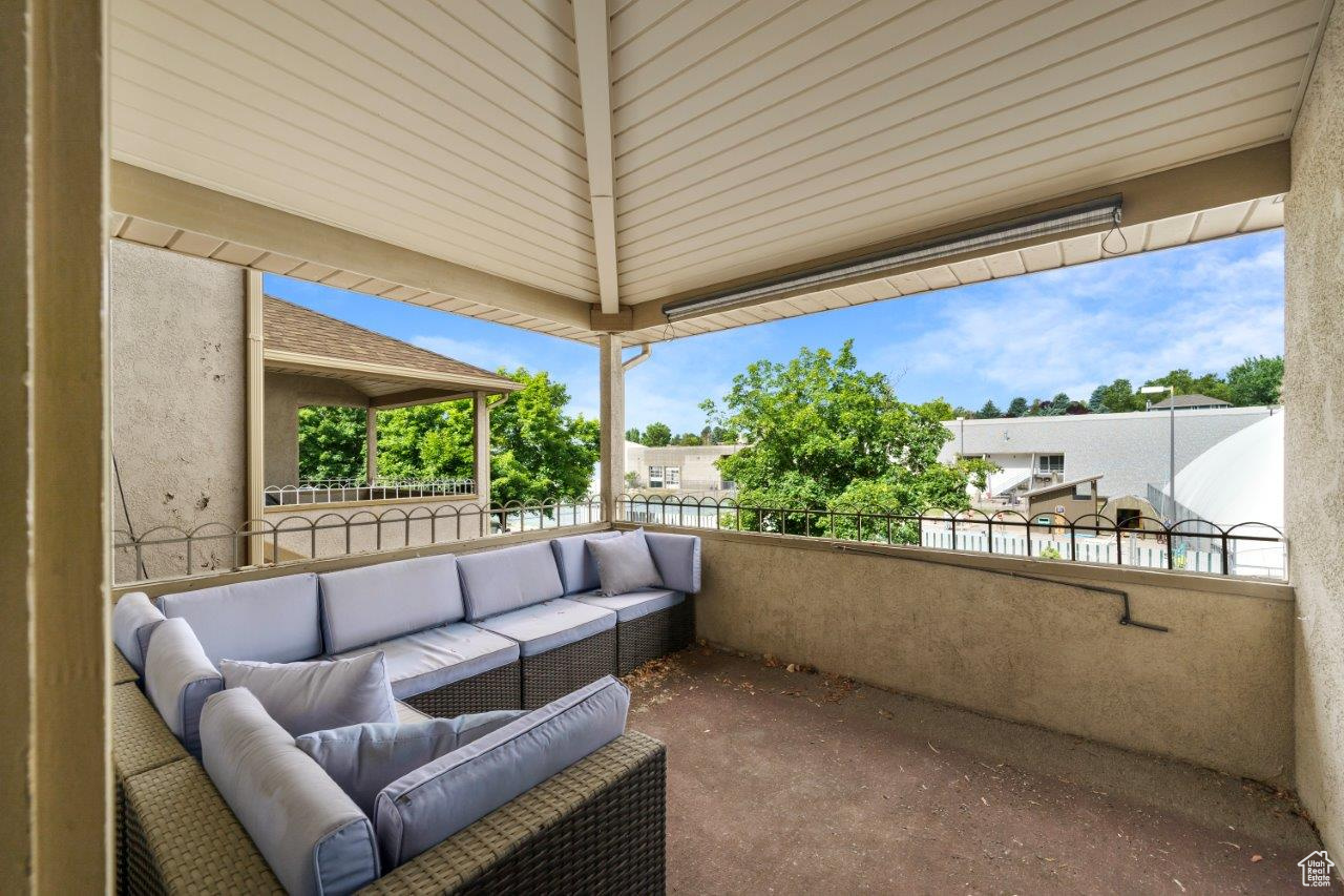 View of patio featuring an outdoor hangout area