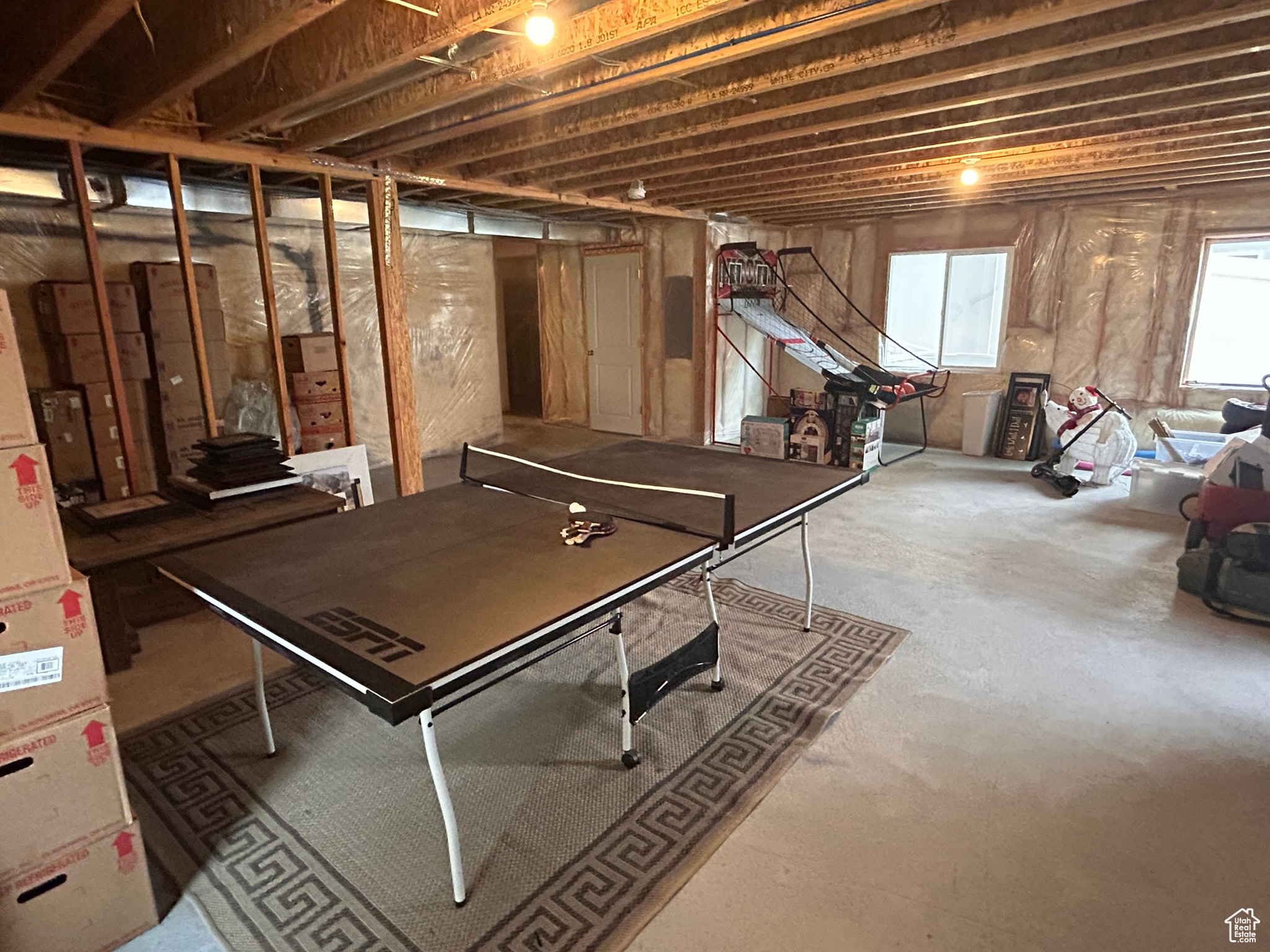 Playroom featuring concrete flooring