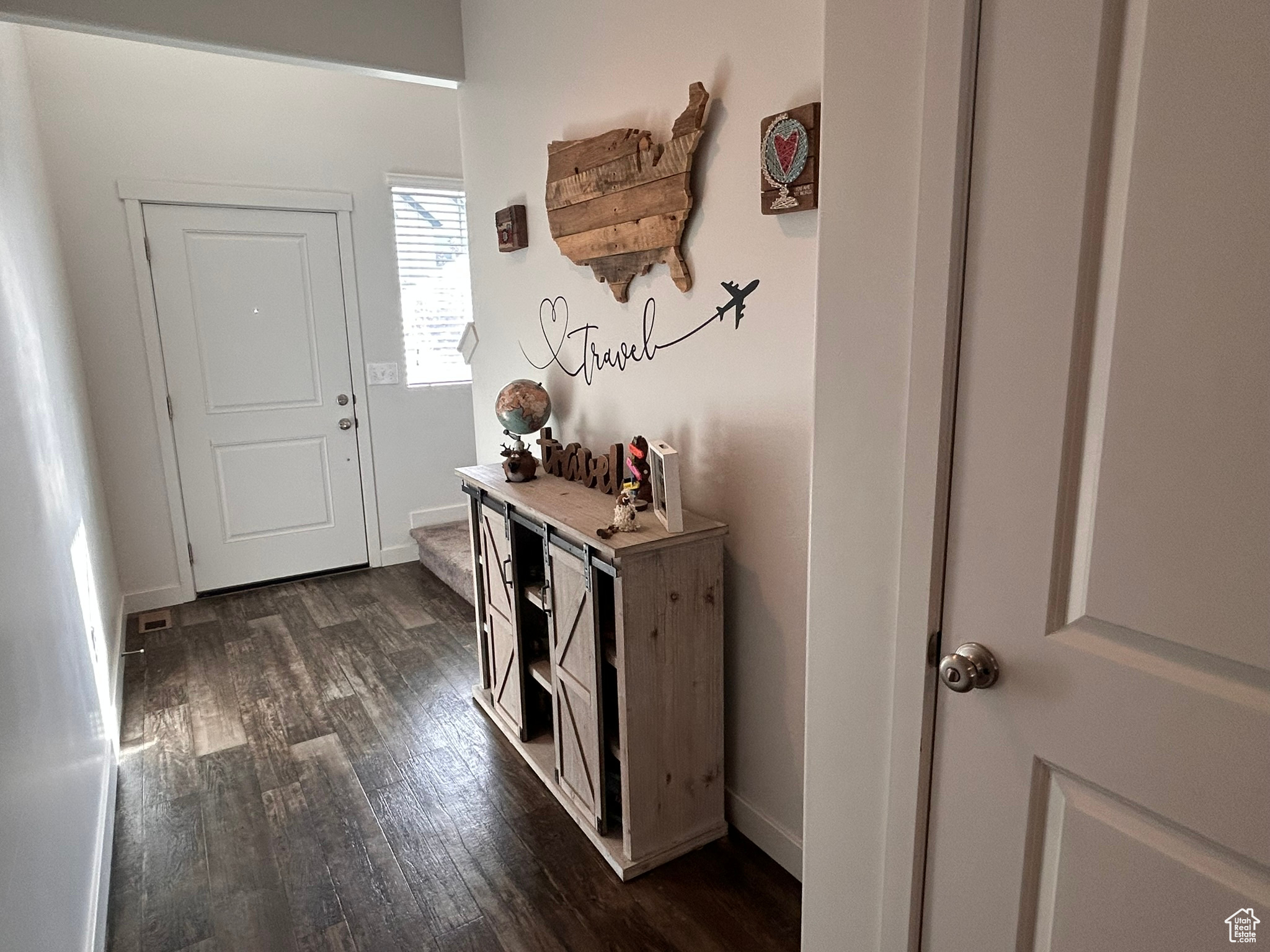 Entryway featuring dark hardwood / wood-style floors