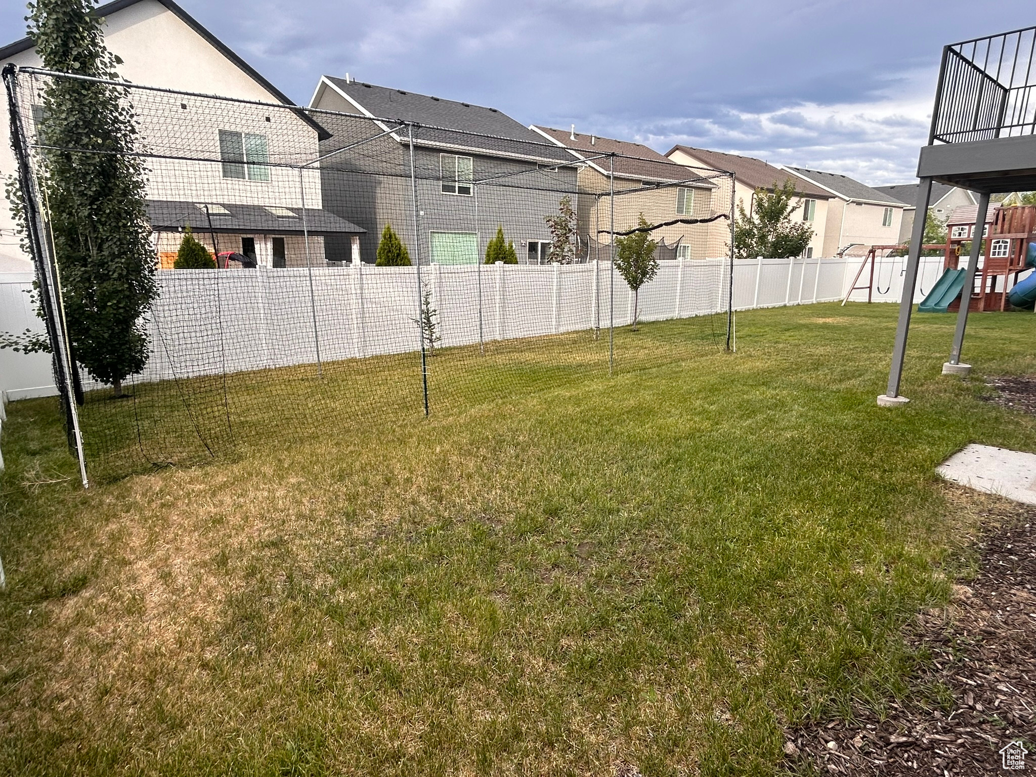 View of yard with a playground