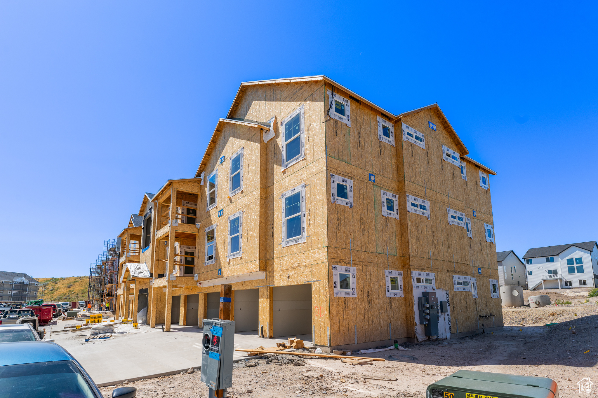 View of building exterior featuring a garage