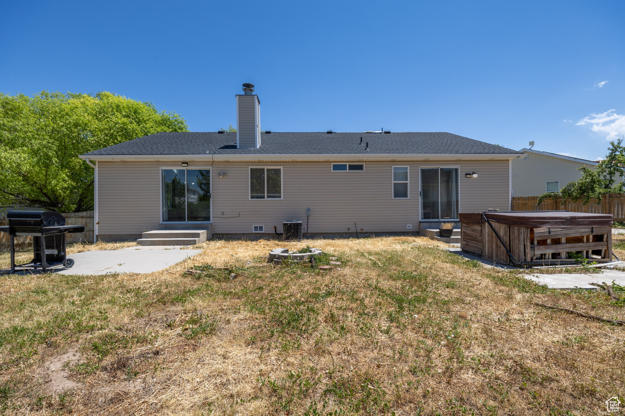 Back yard features 2 patios and RV pad