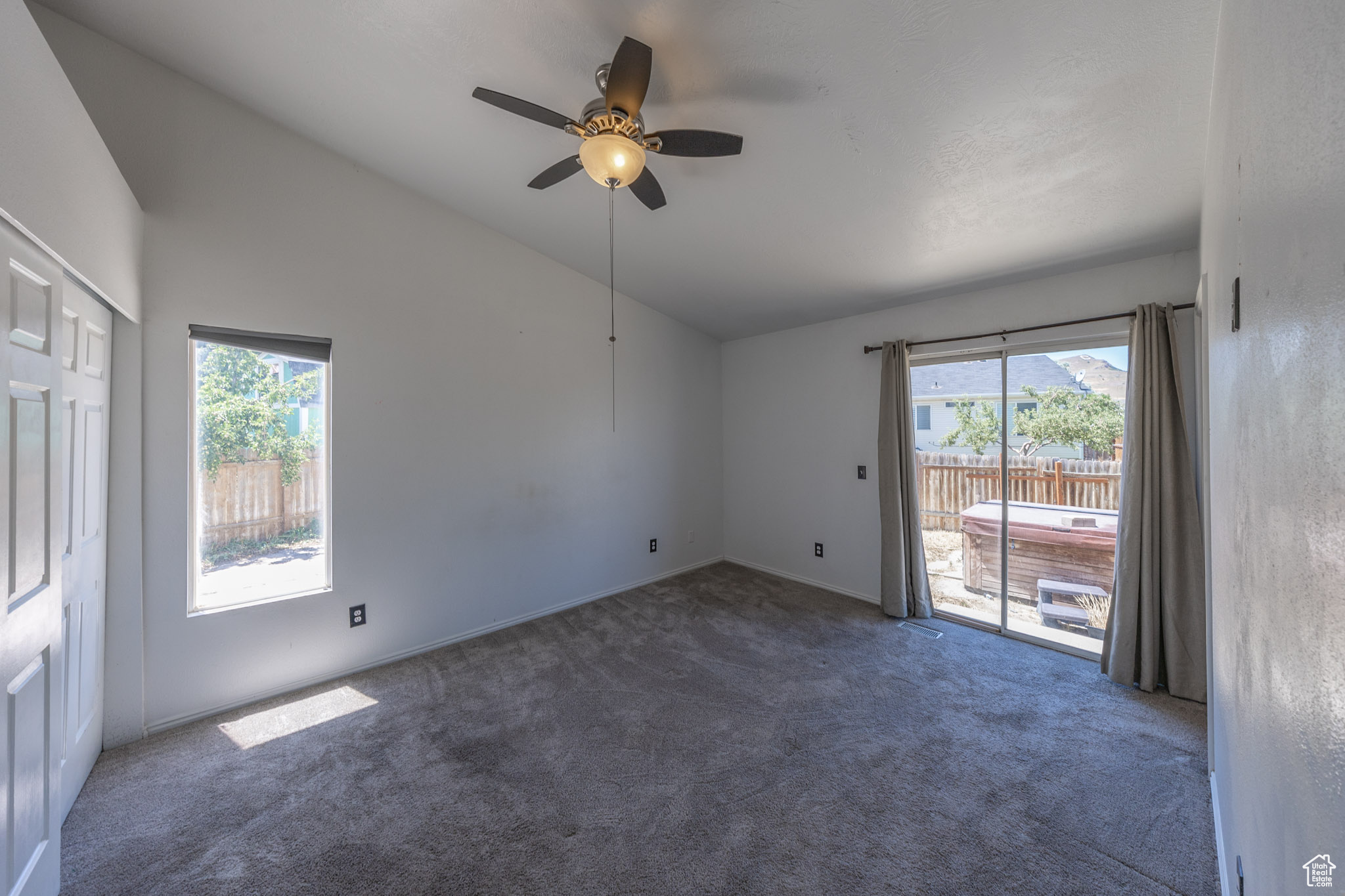 Master bedroom with sliding door to 2nd patio/hot tub.