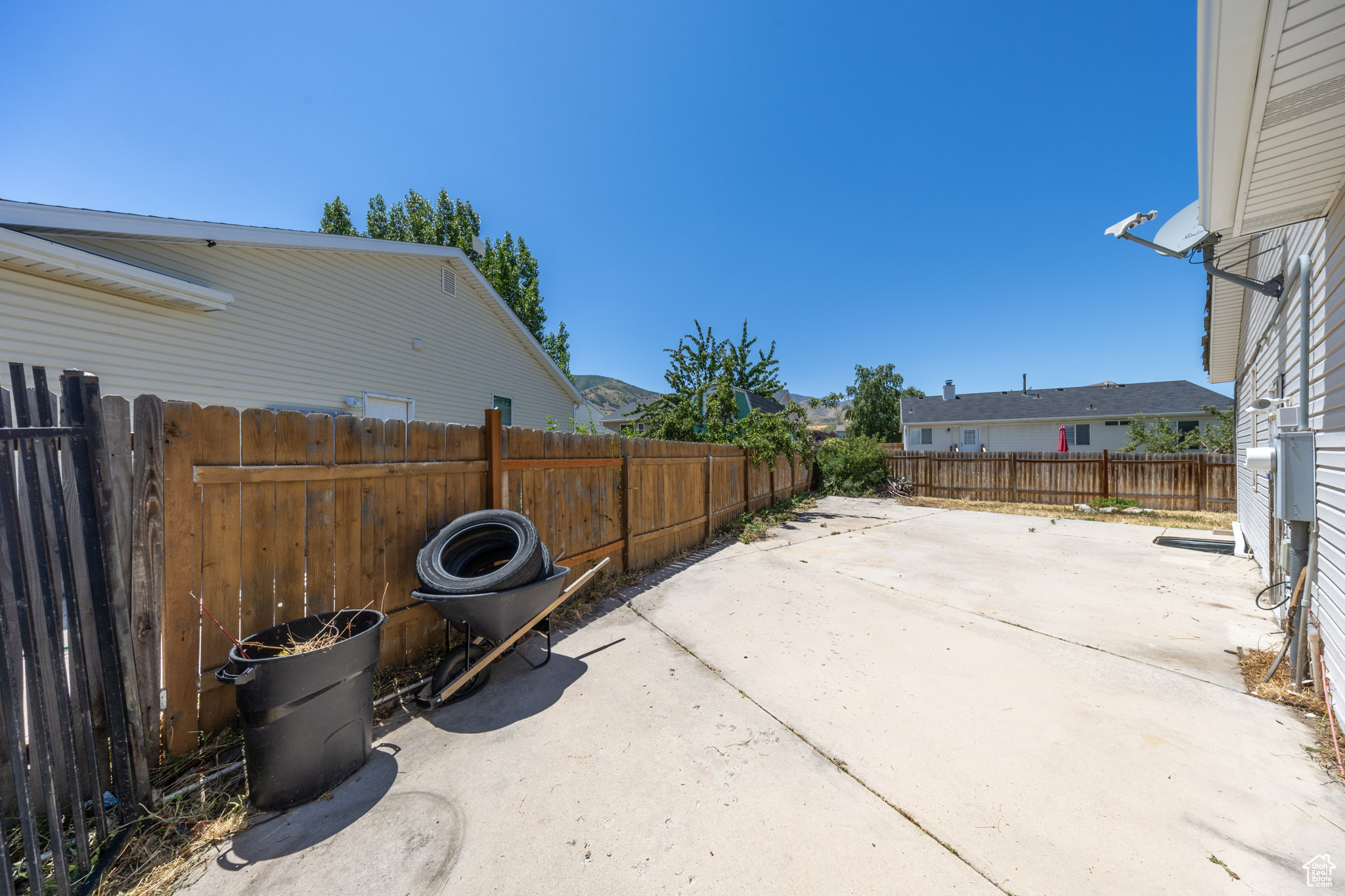 Large RV pad behind front fence. Large enough for an RV and a boat. Bring your toys!