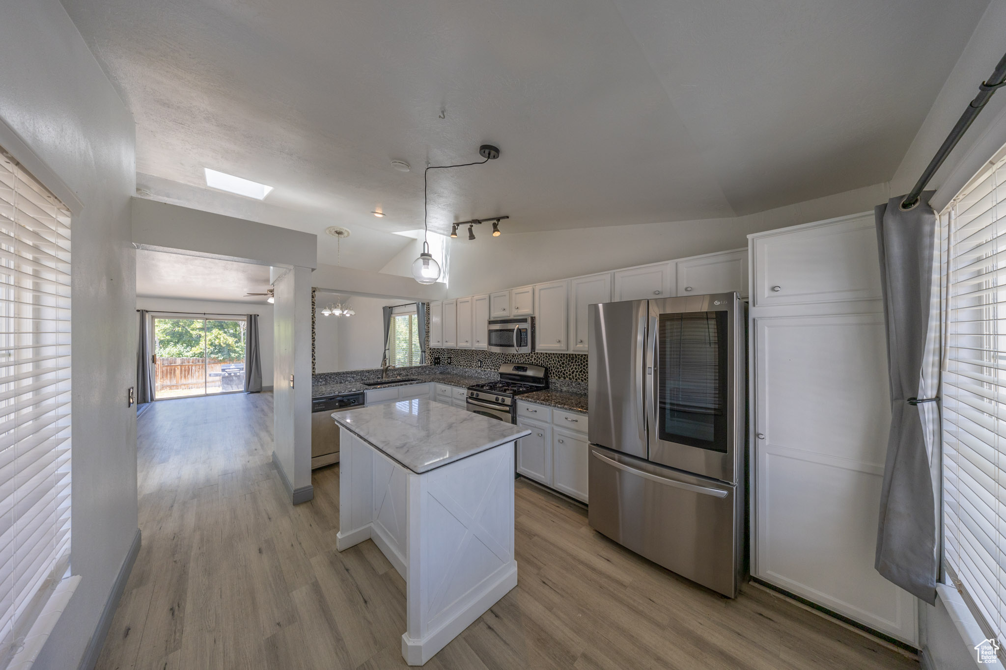 Updated kitchen with stainless steel appliances which are included.