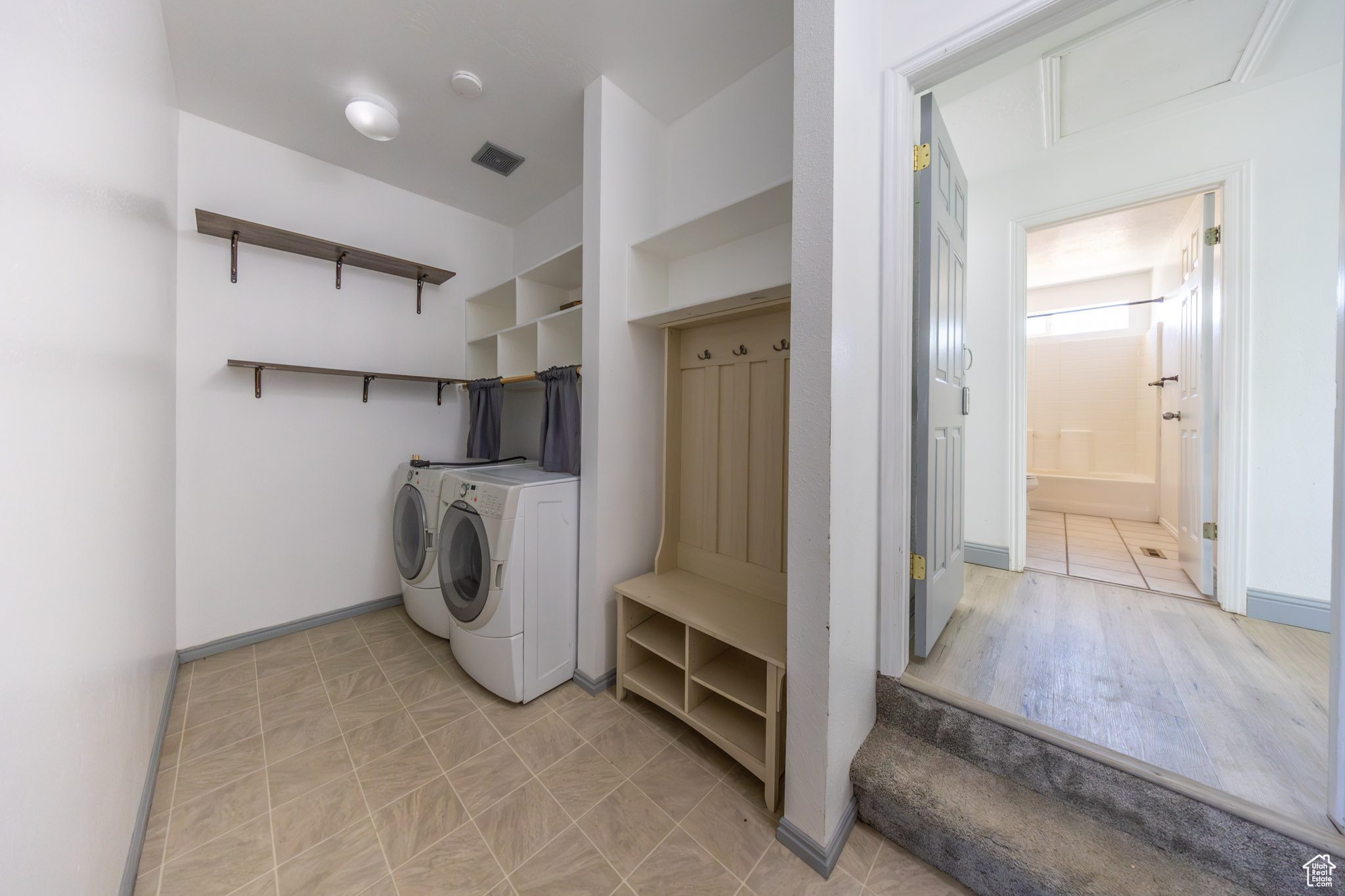 Laundry room/mud room feeds in from the garage. Perfect for taking off those dirty shoes and hanging up coats and backpacks.