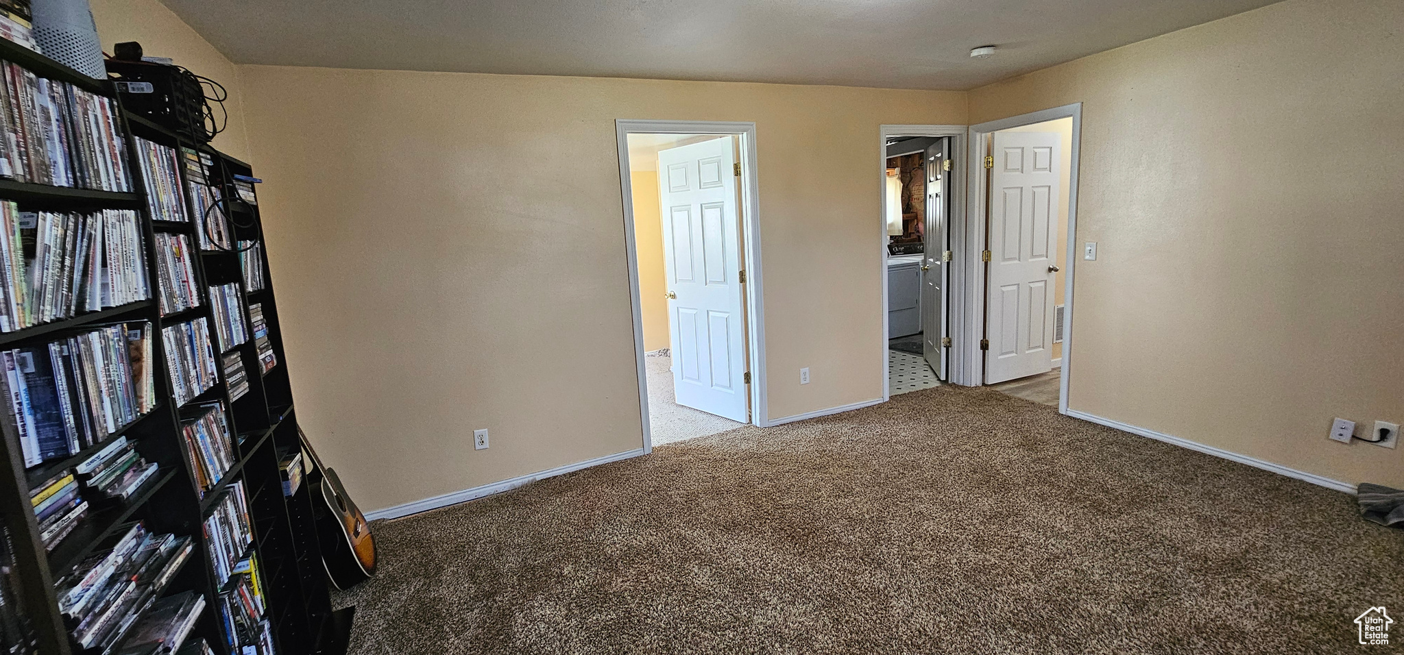 View of carpeted spare room