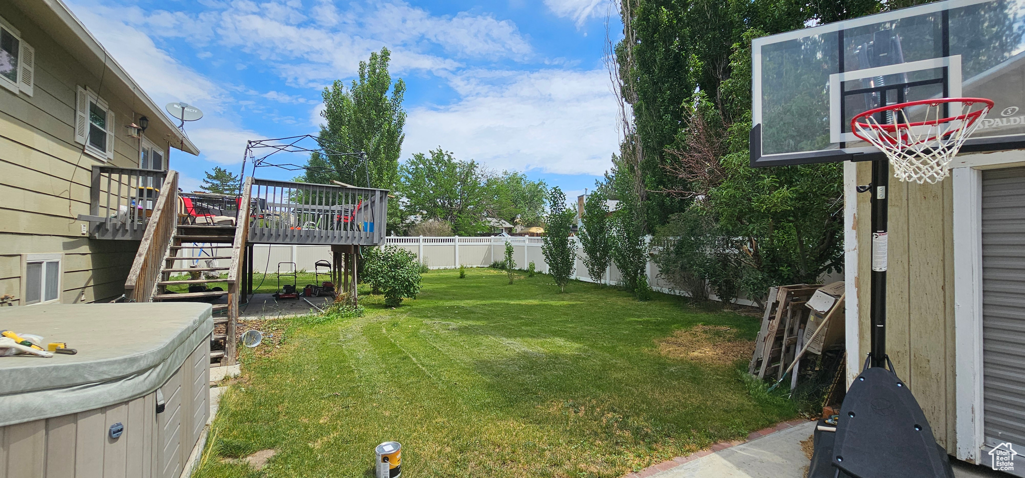 View of yard with a deck