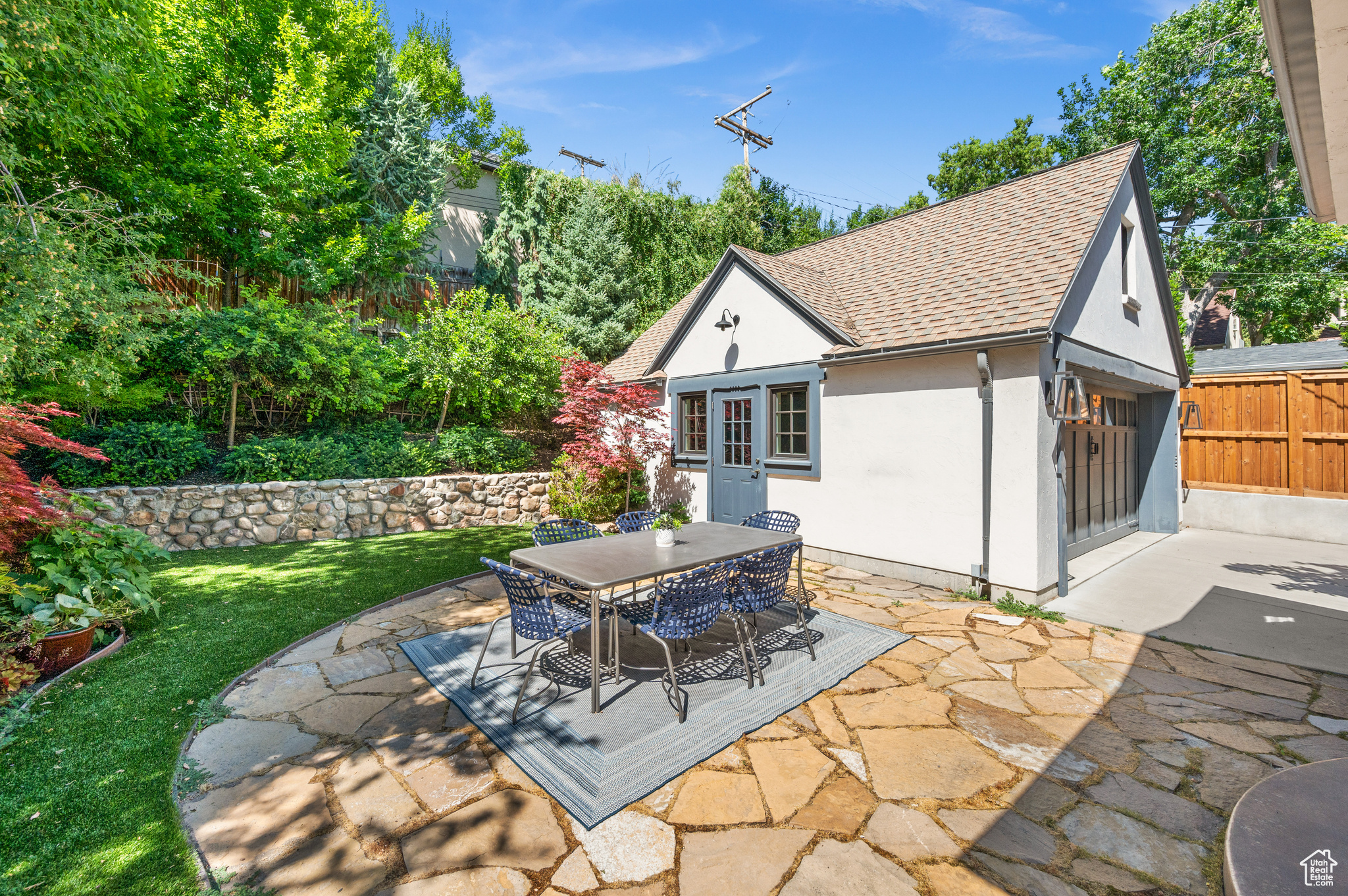 View of patio / terrace and garage