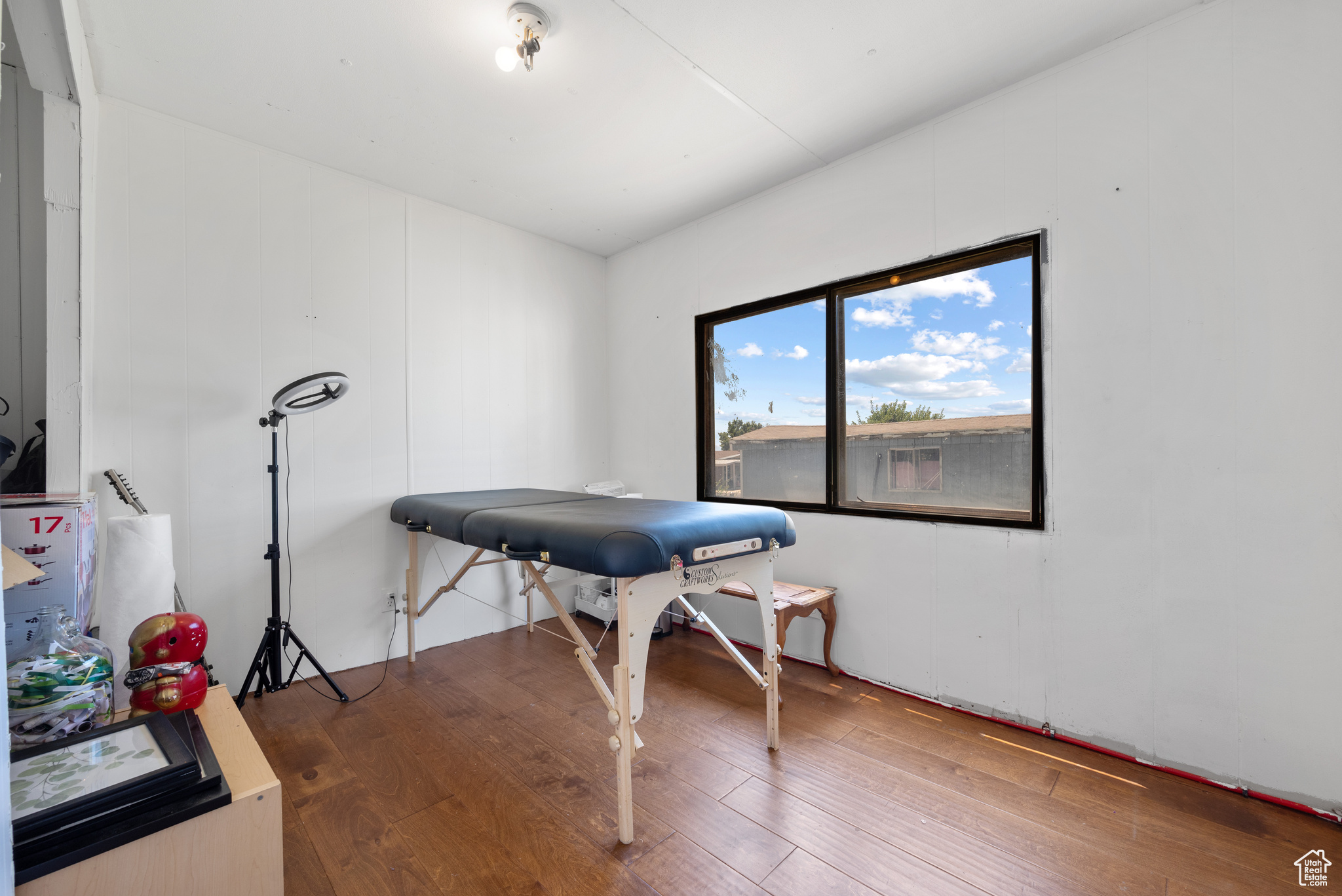 Misc room with wood-type flooring