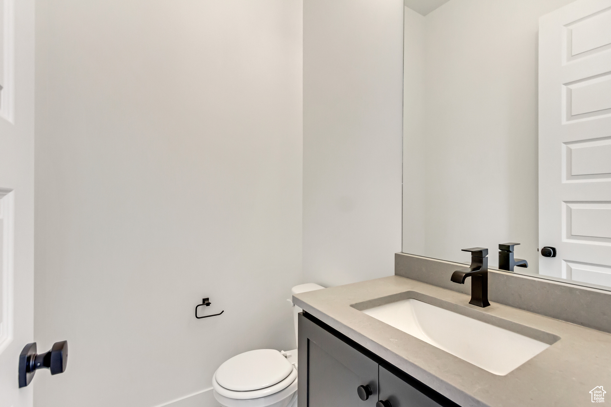 Bathroom with toilet and vanity