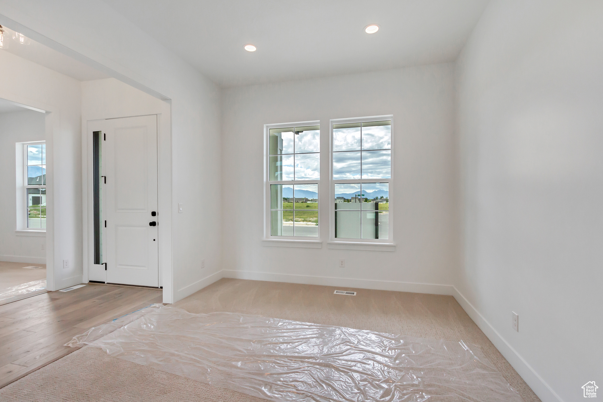 Empty room featuring light hardwood / wood-style flooring