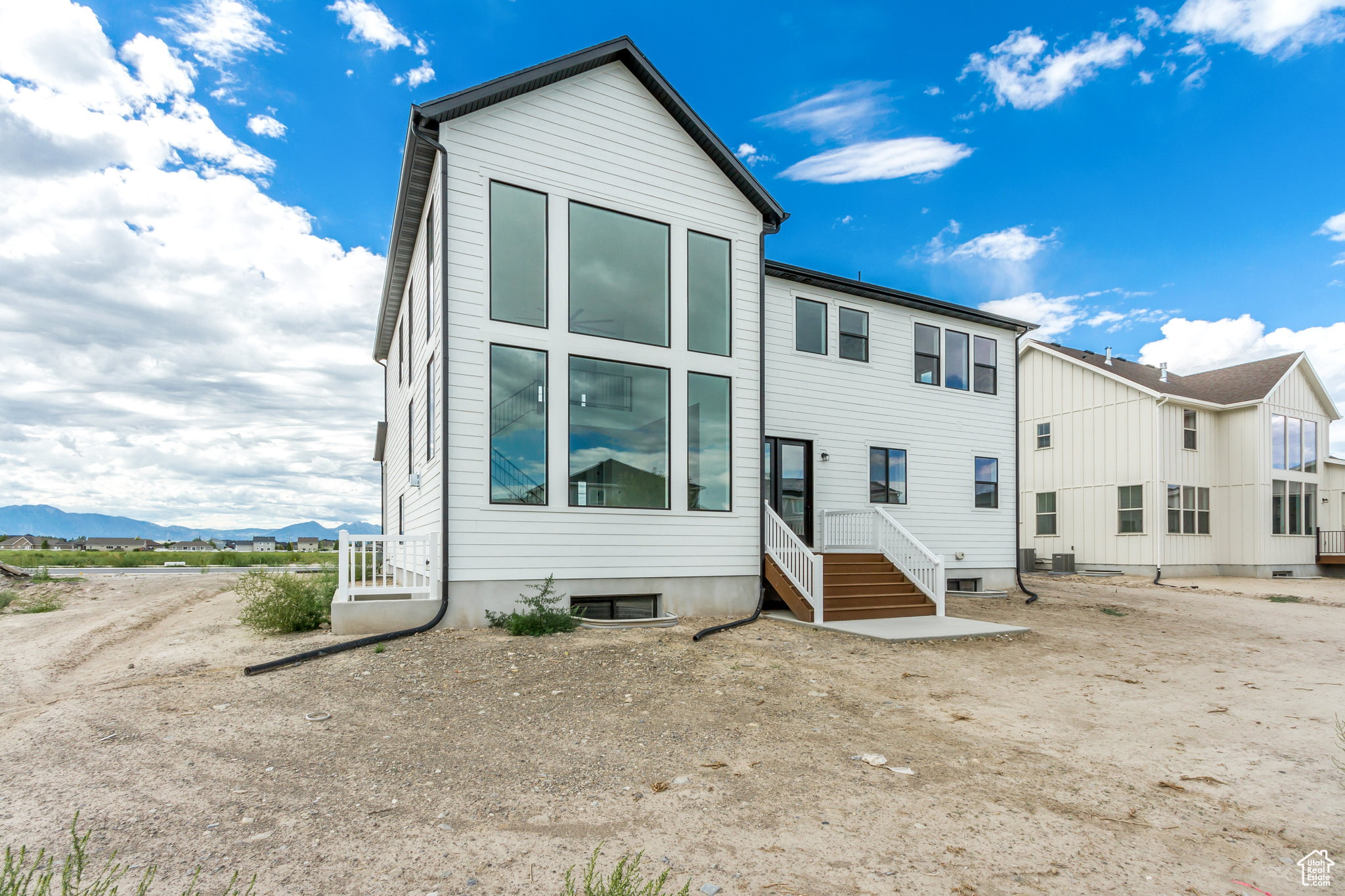 Rear view of property featuring a mountain view