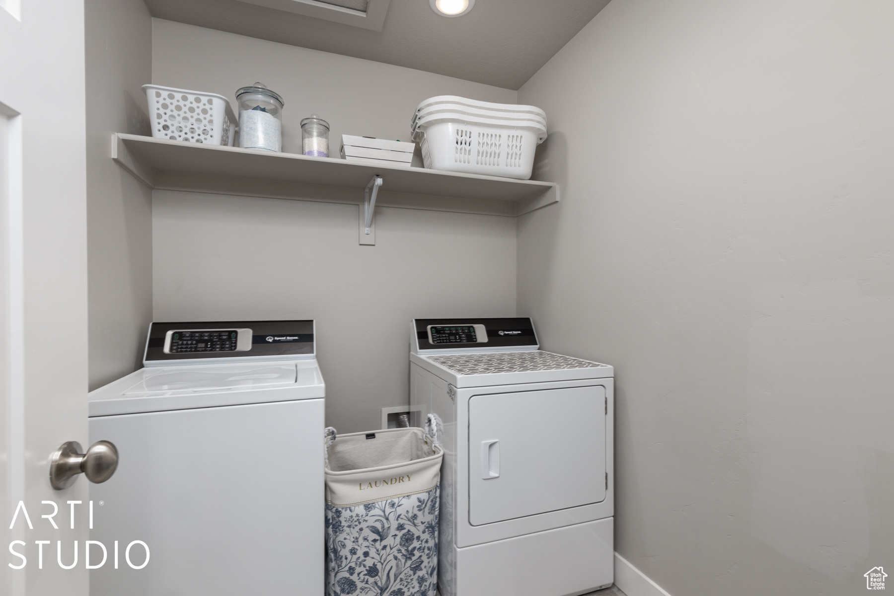 Laundry area with separate washer and dryer