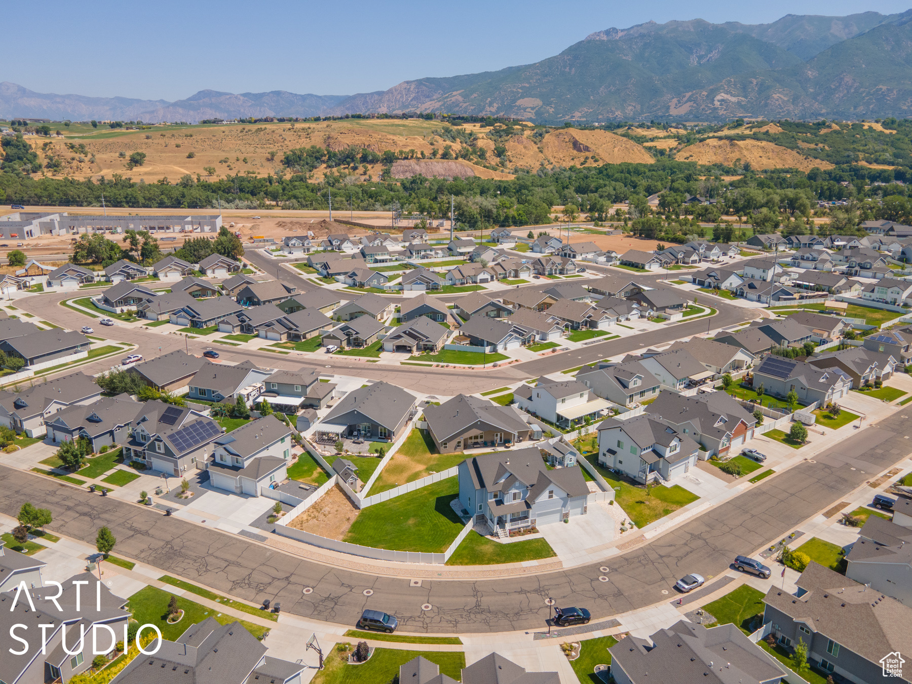 Birds eye view of property with a mountain view