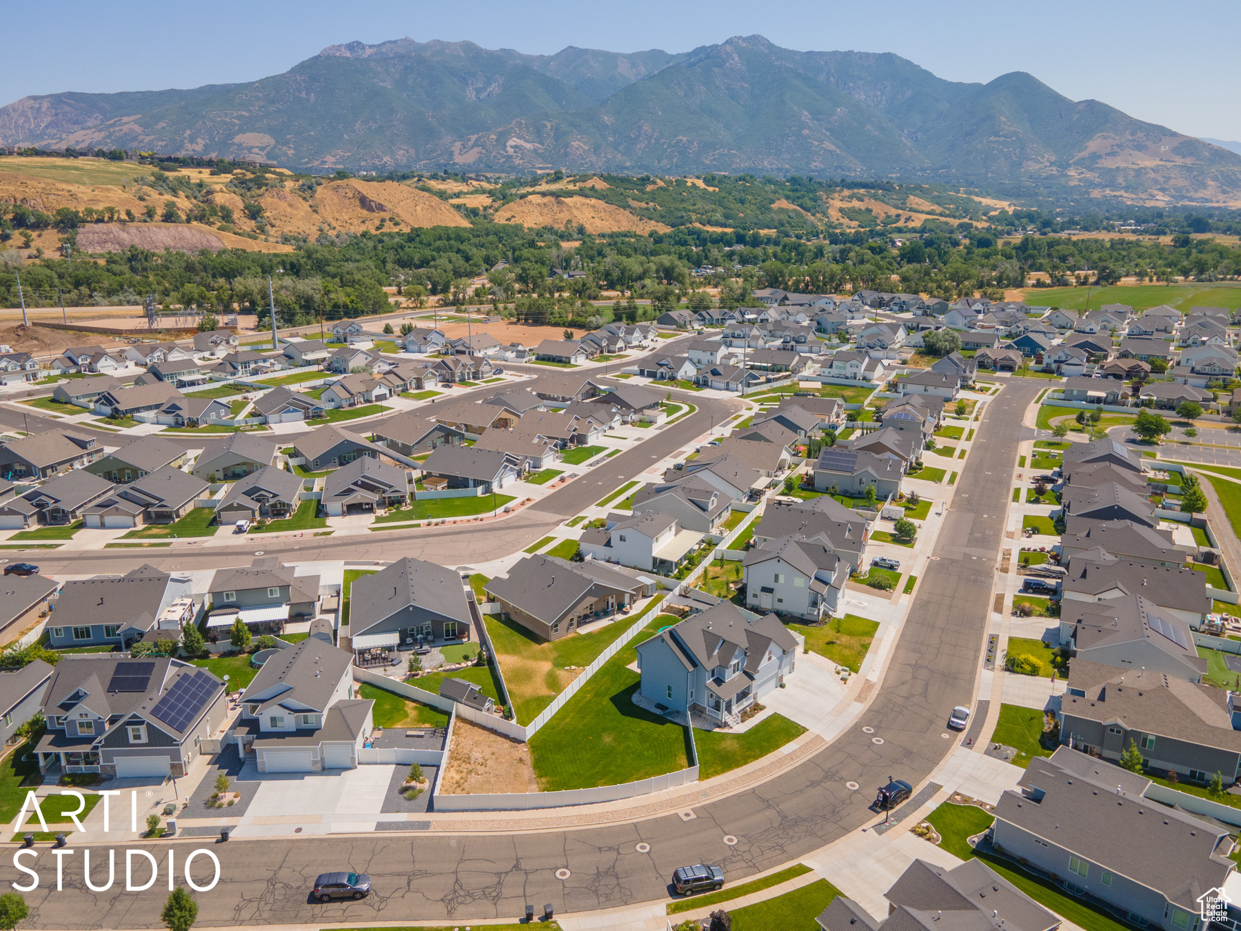 Birds eye view of property with a mountain view