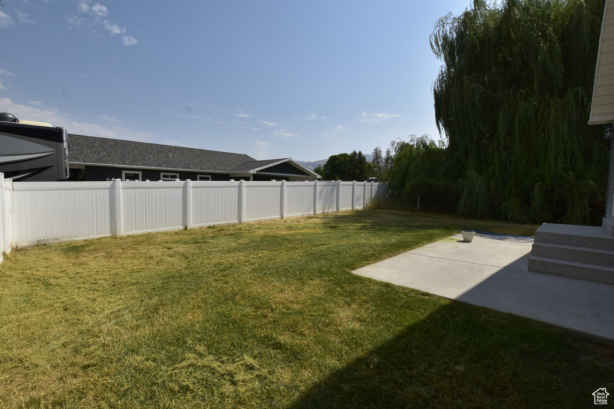 View of yard with a patio area