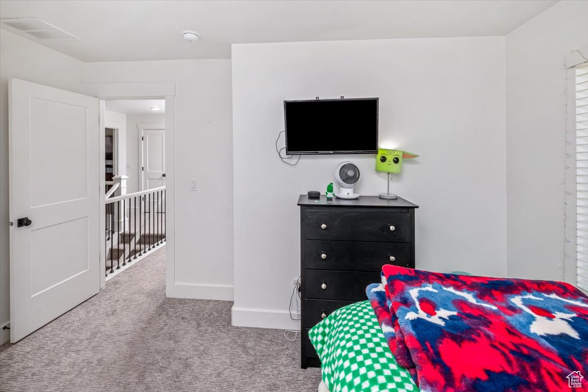 Bedroom with carpet floors