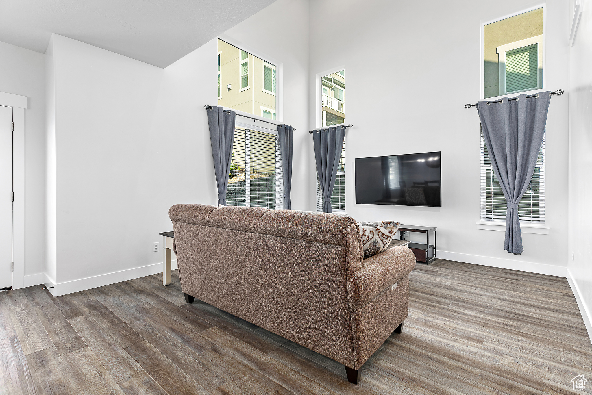 Living room featuring wood-style flooring