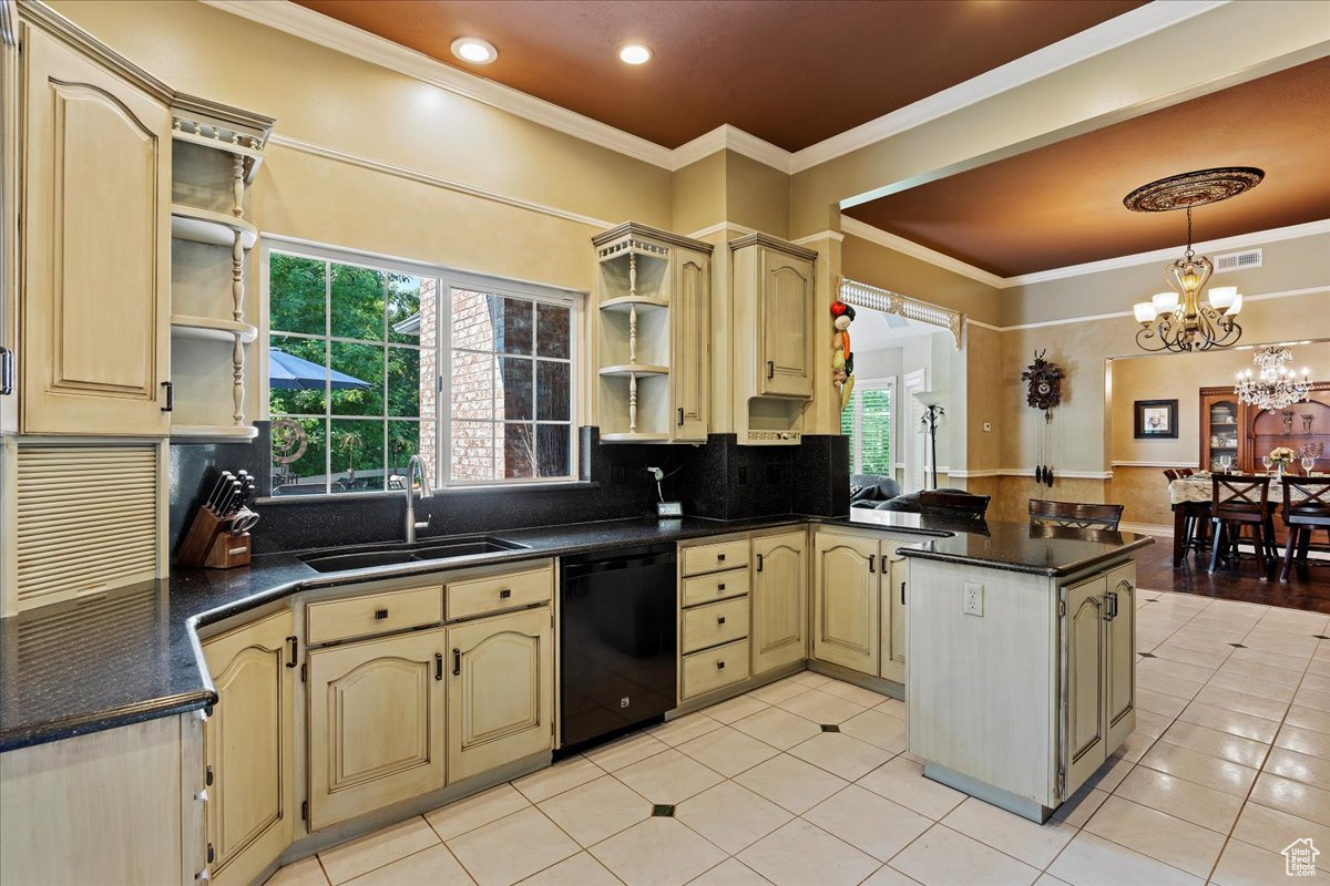 Kitchen with light tile patterned flooring, tasteful backsplash, sink, black dishwasher, and kitchen peninsula