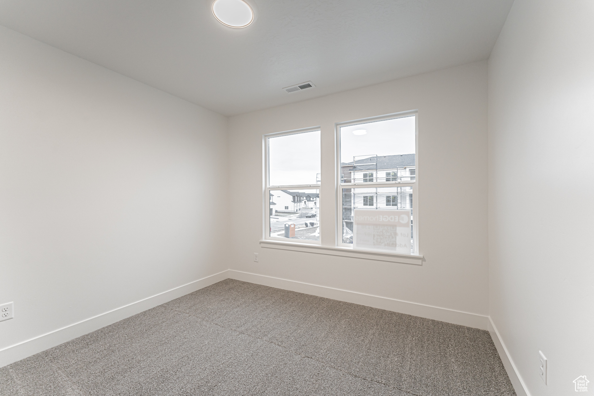 Unfurnished room featuring carpet floors